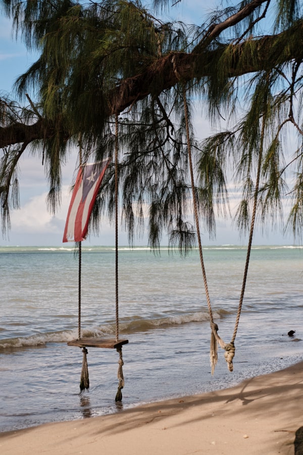 The exclusive view of Grand Reserve's private beach offers a serene escape, with swaying palm trees and the soft sound of waves, epitomizing the essence of luxury in harmony with nature